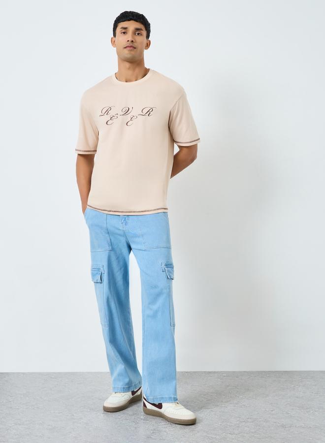 ستايلي تيشيرت بطبعة جرافيك وبقصة واسعة - Image 1